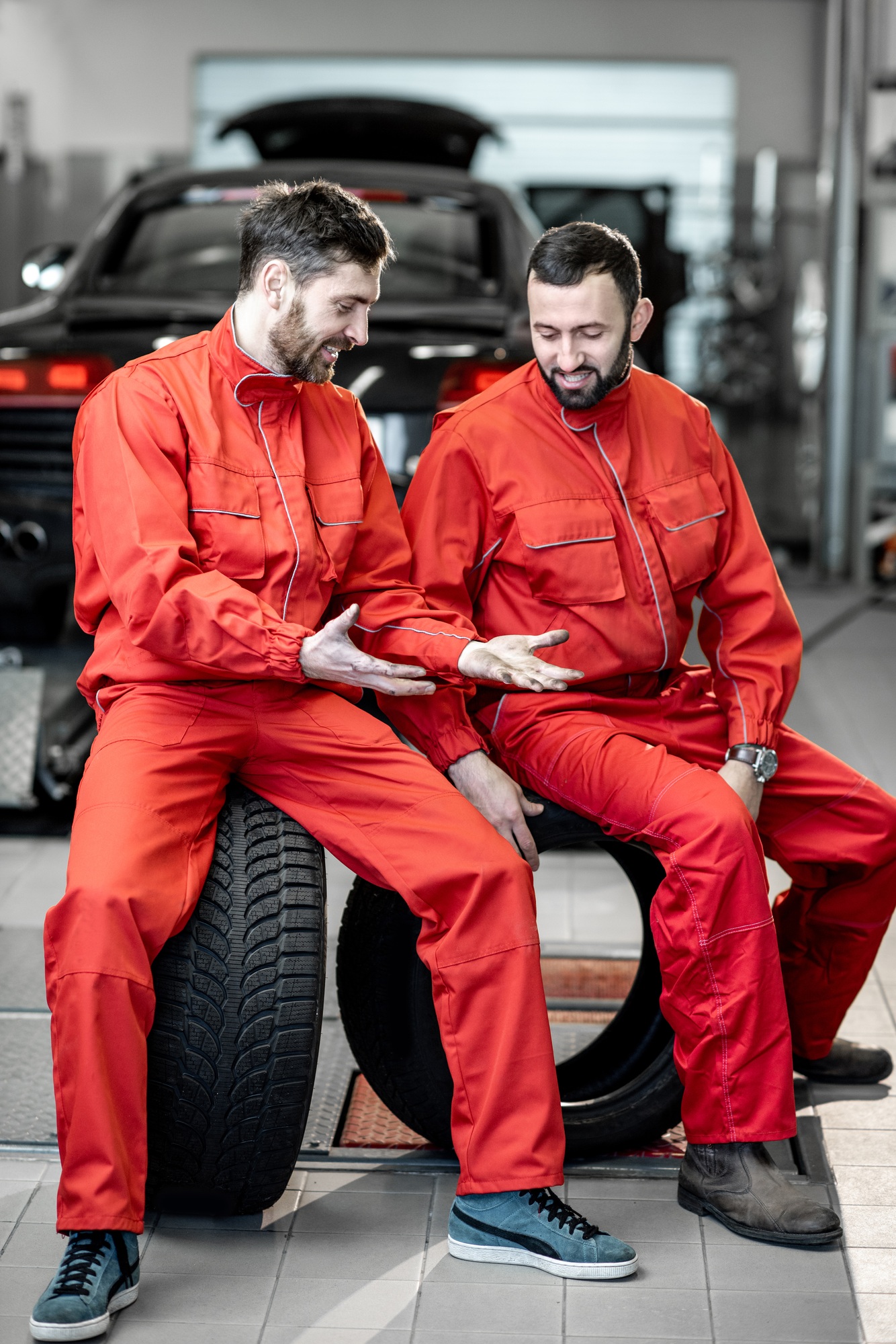 Car service workers during the break at the tire mounting service